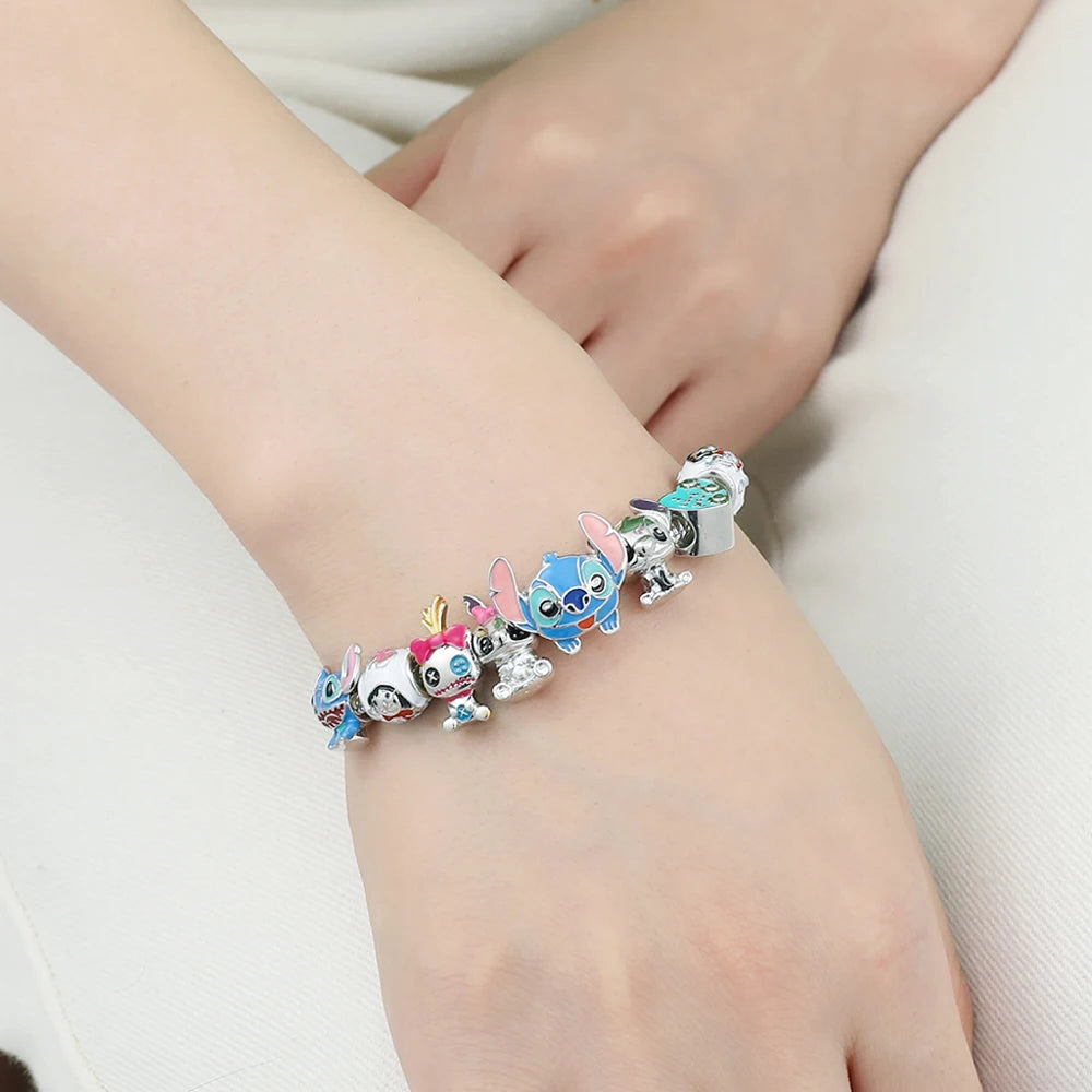 ✨ Bracciale Lilo & Stitch - Charm in Metallo, Perle Colorate, Regalo Magico per Donne e Bambine!
Ispirato al cartoon hawaiano, perfetto per appassionate e collezioniste