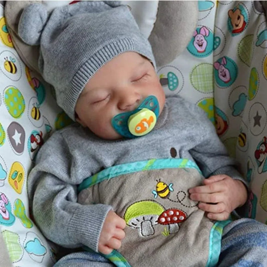 👶🏼 Bambola Reborn Levi 19" - Corpo in Vinile Iperrealista, Capelli Dipinti a Mano
Perfetta per collezionisti e regali! Sembra un vero neonato. 🎁✨