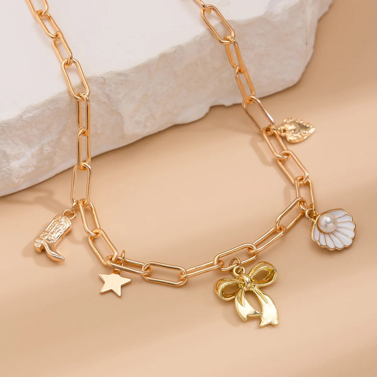 Collana Donna Retro: Ciondolo Occhio Malocchio, Croce e Stella Marina in Metallo - Gioiello con Elementi Marini