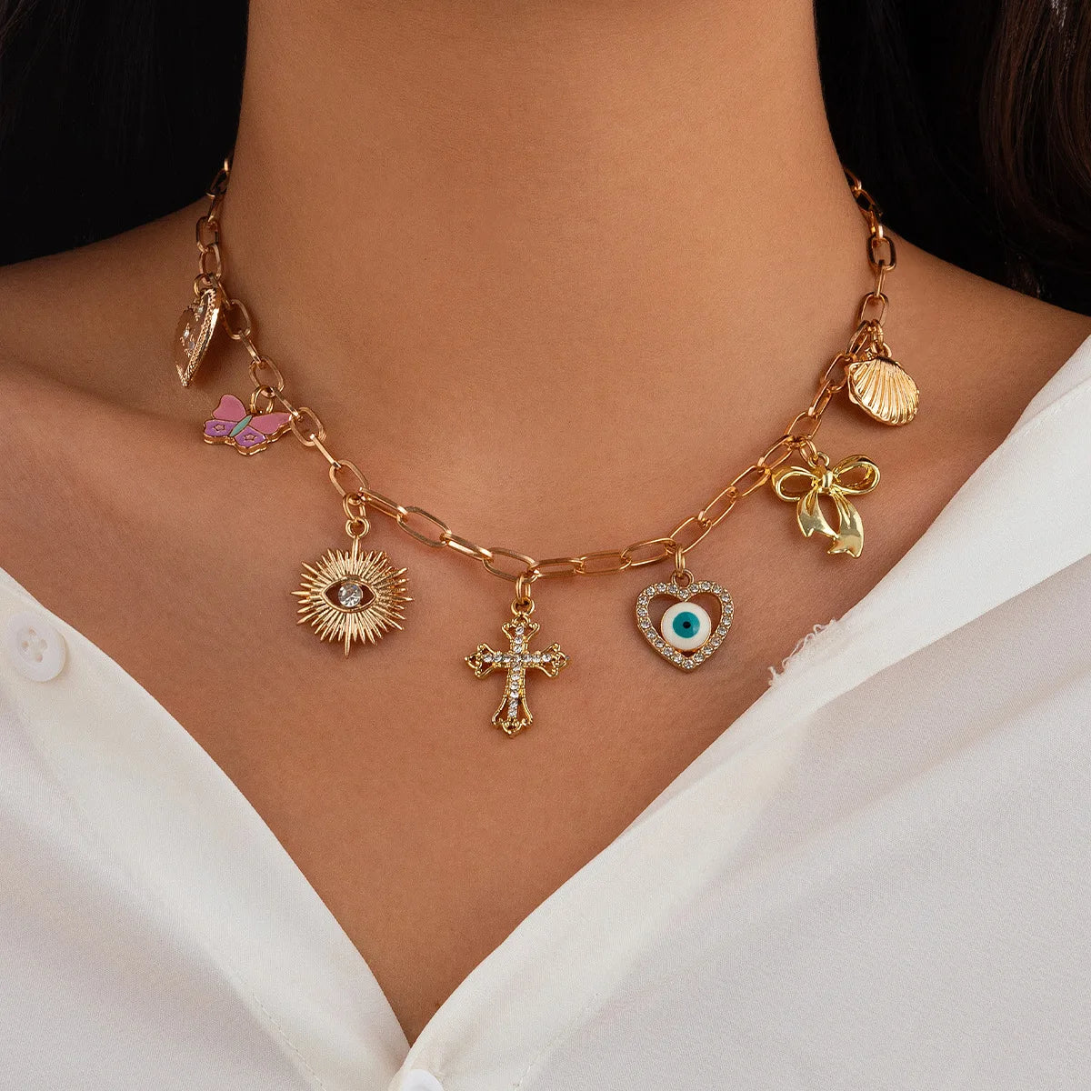 Collana Donna Retro: Ciondolo Occhio Malocchio, Croce e Stella Marina in Metallo - Gioiello con Elementi Marini