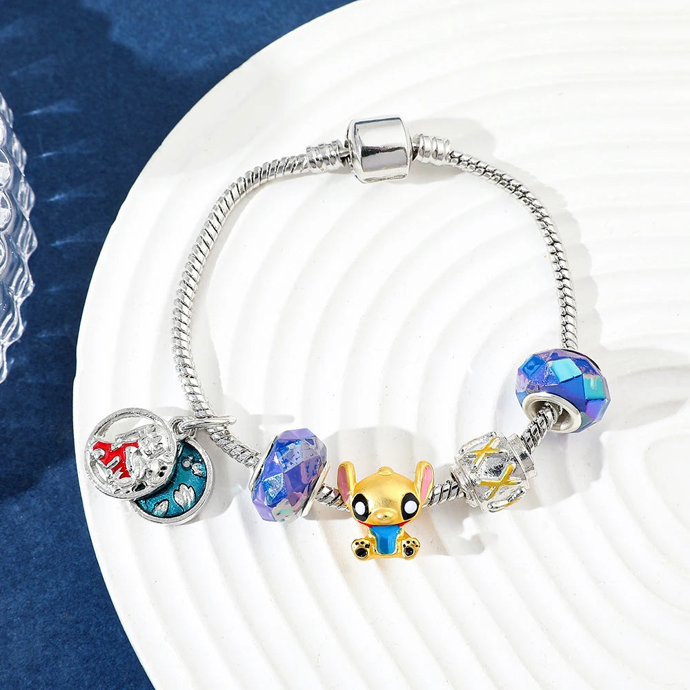 ✨ Bracciale Lilo & Stitch - Charm in Metallo, Perle Colorate, Regalo Magico per Donne e Bambine!
Ispirato al cartoon hawaiano, perfetto per appassionate e collezioniste