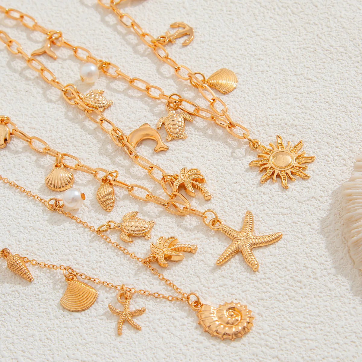 Collana Donna Retro: Ciondolo Occhio Malocchio, Croce e Stella Marina in Metallo - Gioiello con Elementi Marini