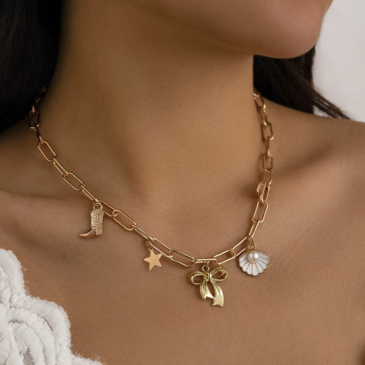 Collana Donna Retro: Ciondolo Occhio Malocchio, Croce e Stella Marina in Metallo - Gioiello con Elementi Marini