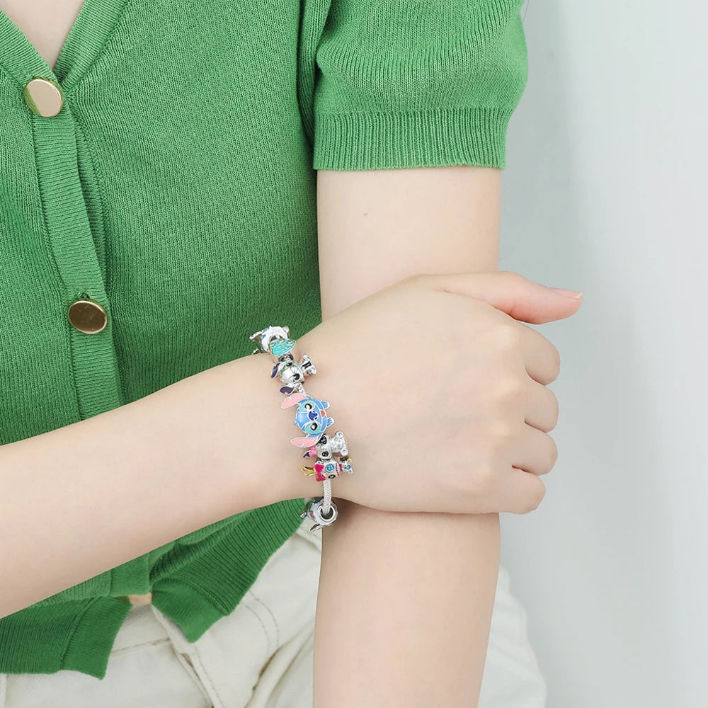 ✨ Bracciale Lilo & Stitch - Charm in Metallo, Perle Colorate, Regalo Magico per Donne e Bambine!
Ispirato al cartoon hawaiano, perfetto per appassionate e collezioniste